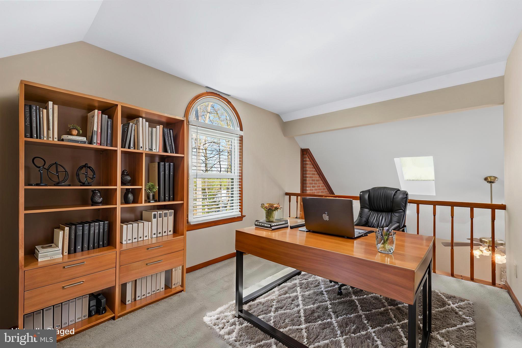 233 Choptank Road Stafford, VA 22556 - Photo 30 of 65 a living room with furniture a window and a book shelf