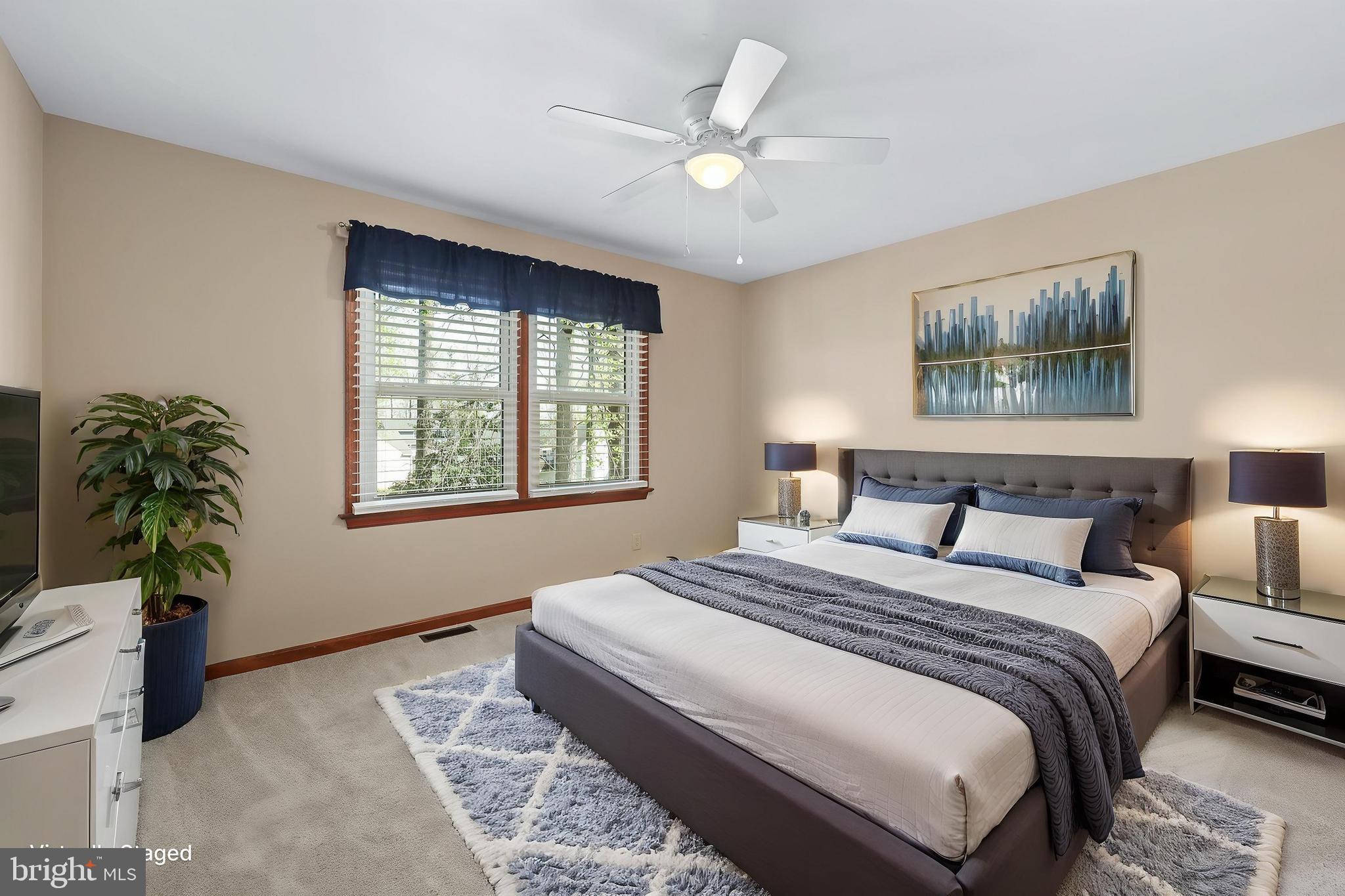233 Choptank Road Stafford, VA 22556 - Photo 33 of 65 a bedroom with a large bed and a window