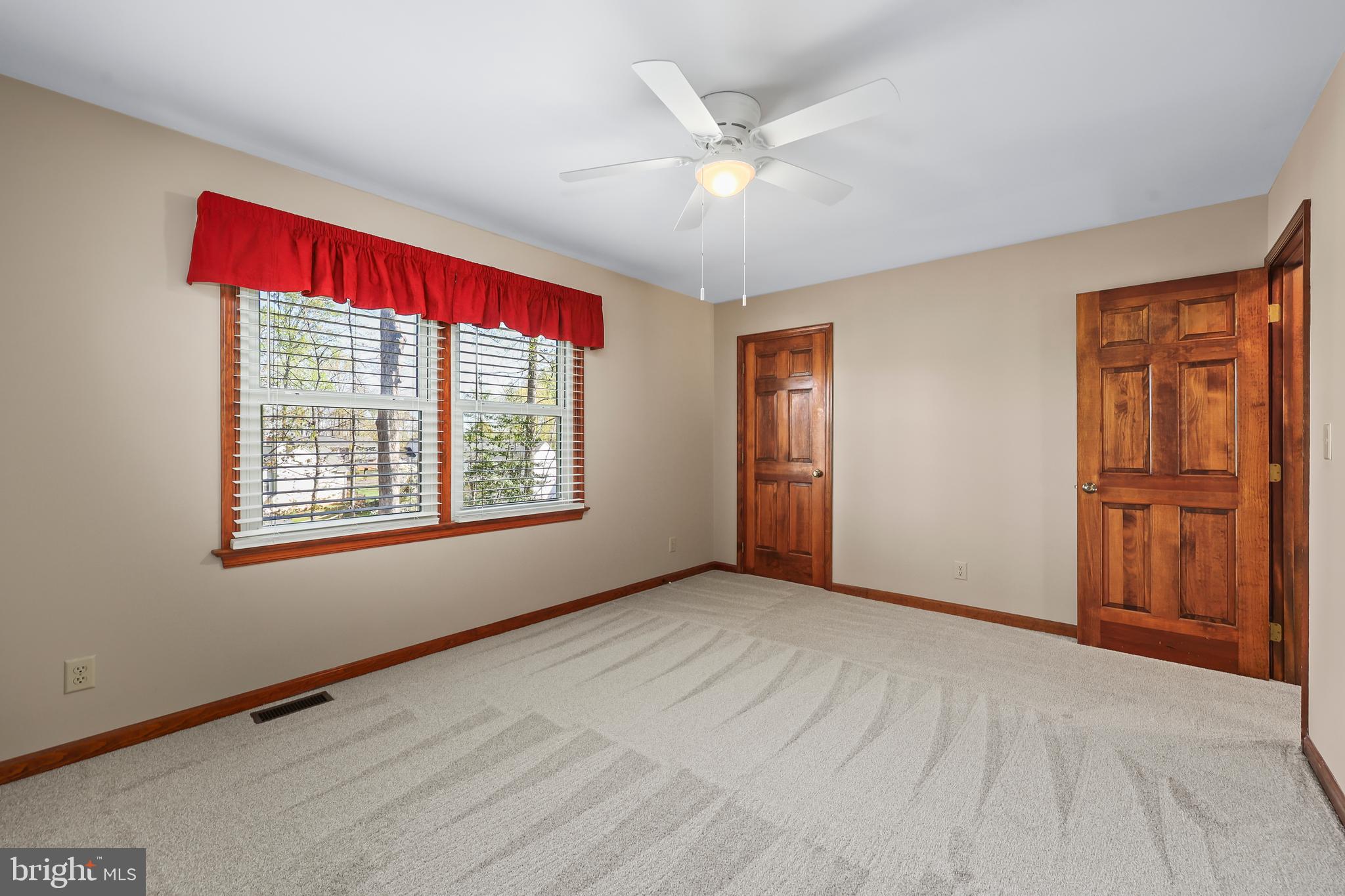 233 Choptank Road Stafford, VA 22556 - Photo 37 of 65 a view of an empty room with window and closet area