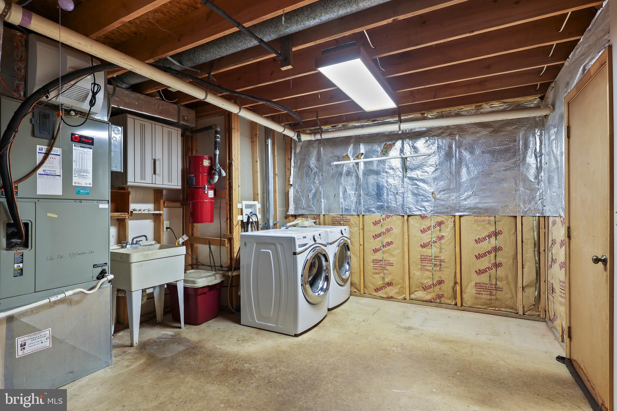 233 Choptank Road Stafford, VA 22556 - Photo 48 of 65 a utility room with dryer and washer