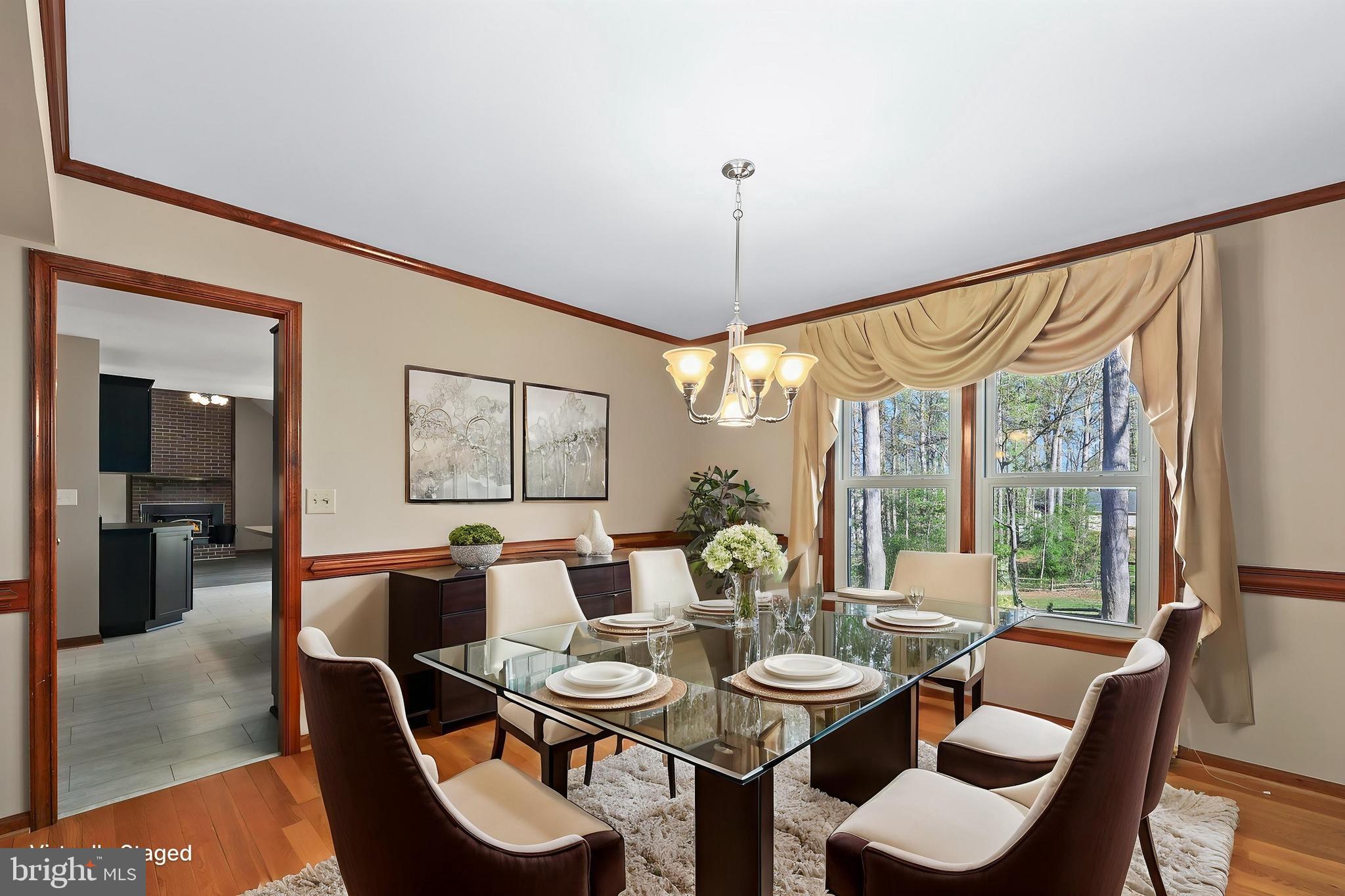 233 Choptank Road Stafford, VA 22556 - Photo 8 of 65 a view of a dining room with furniture window and outside view