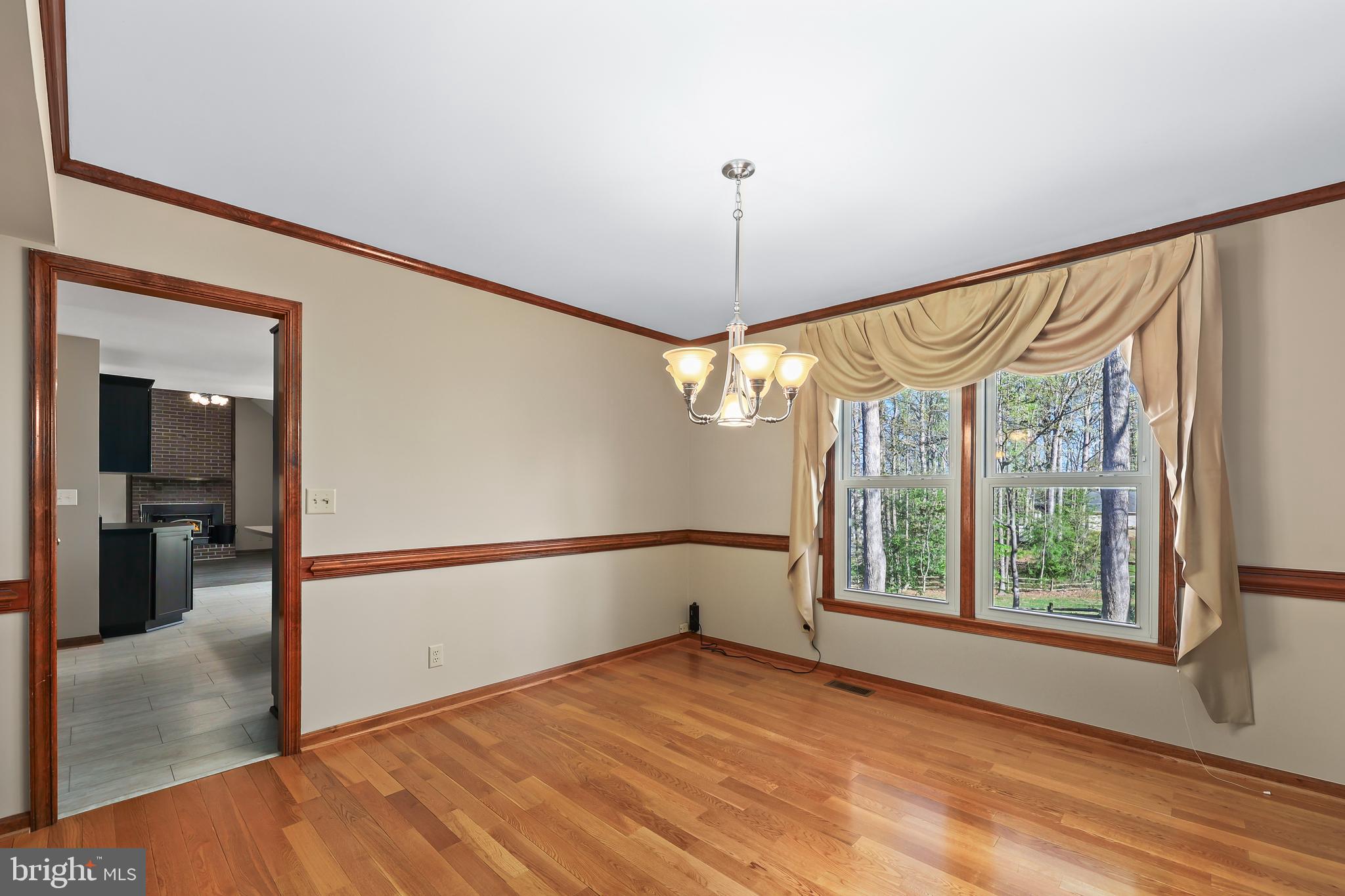 233 Choptank Road Stafford, VA 22556 - Photo 9 of 65 a view of an empty room with a window