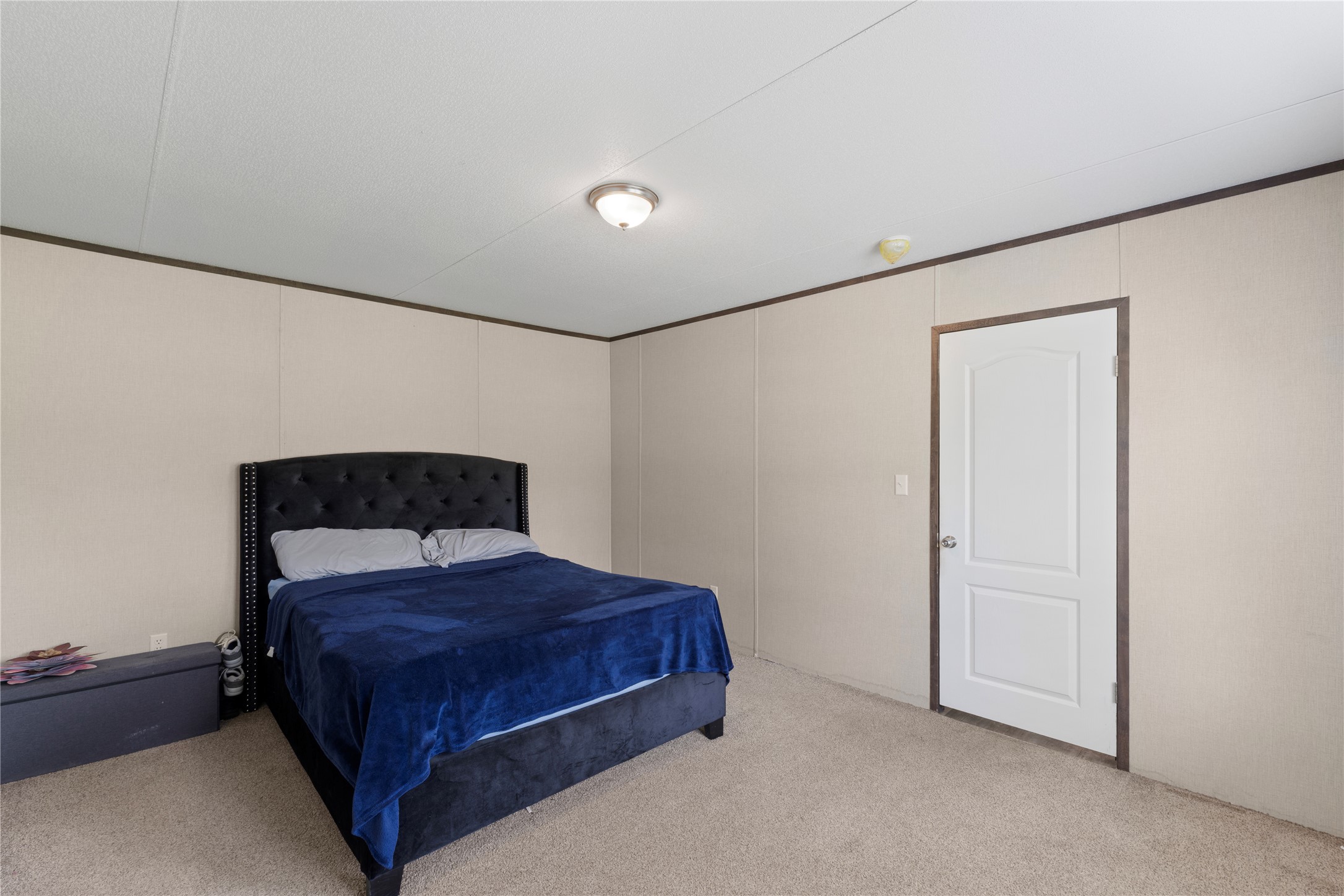 109 Hibiscus Cove Elgin, TX 78621 - Photo 7 of 15 A restful bedroom offers comfort and a tranquil escape.