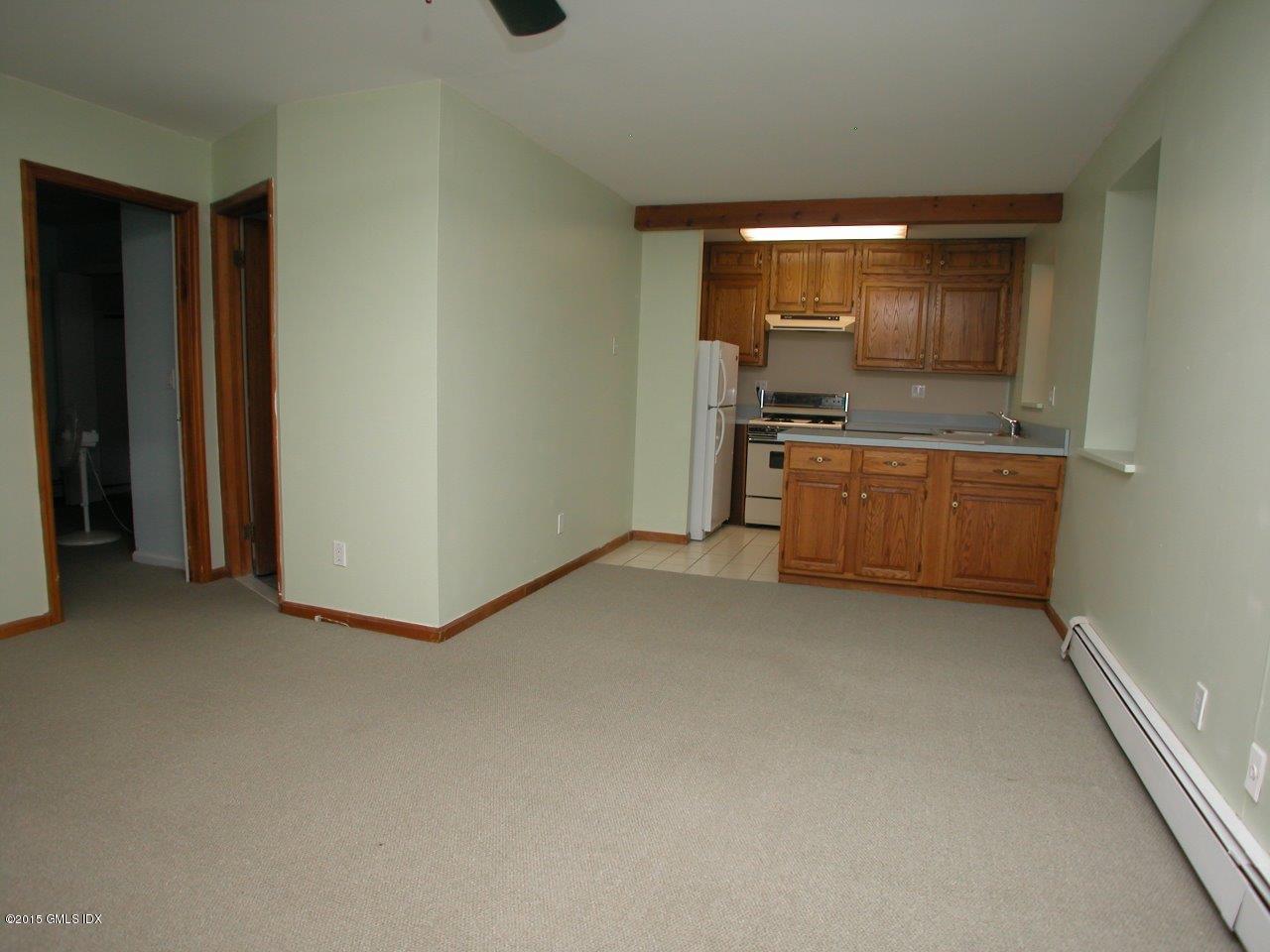 59-61 Valley Road Cos Cob, CT 06807 - Photo 12 of 26 a room with a kitchen and a sink