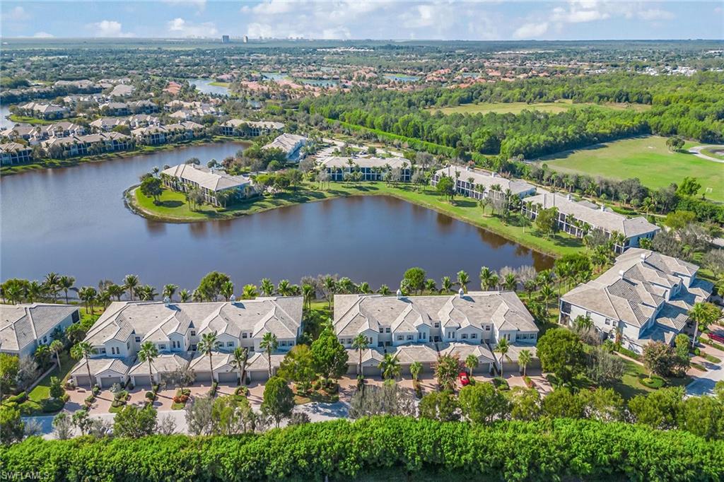9275 Museo Circle, Unit 103 Naples, FL 34114 - Photo 1 of 49 an aerial view of a city with lake view