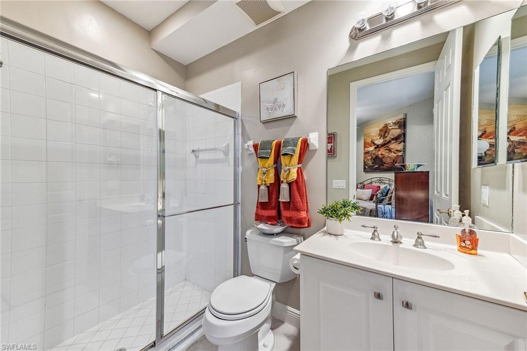9275 Museo Circle, Unit 103 Naples, FL 34114 - Photo 20 of 49 a bathroom with a sink toilet and shower