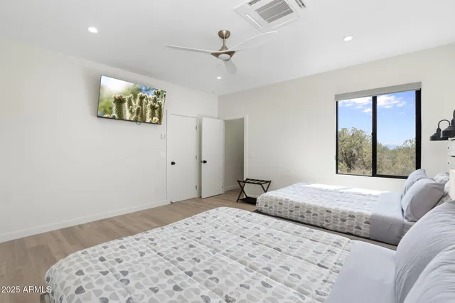 a view of a balcony with table and chairs