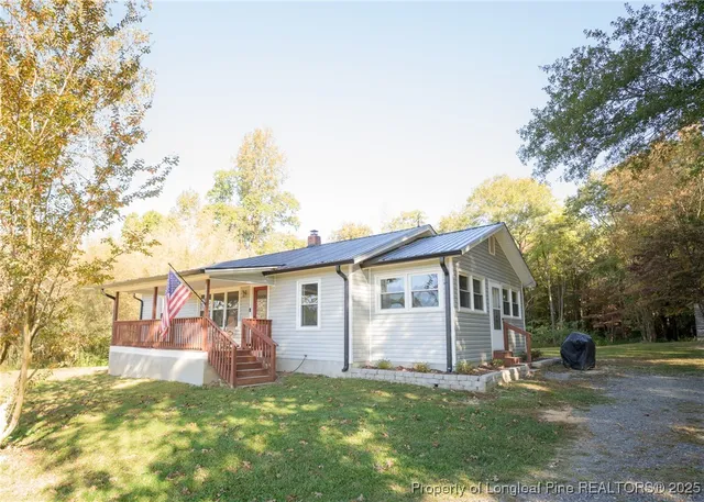 a balcony with wooden floor