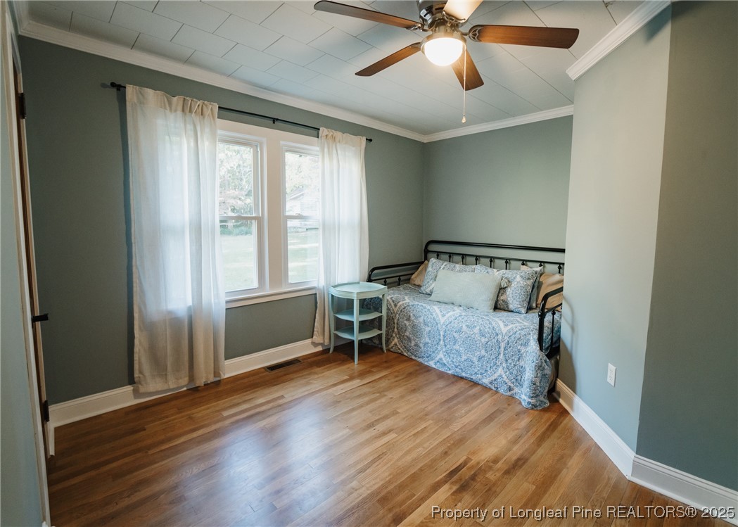 9778 Highway 24 Carthage, NC 28327 - Photo 35 of 47 a bedroom with a bed and a window