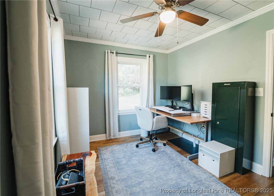 9778 Highway 24 Carthage, NC 28327 - Photo 39 of 47 a view of a workspace with furniture and a window