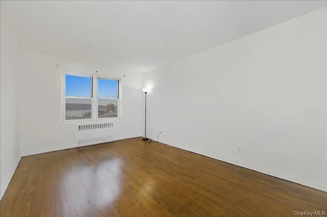 a bathroom with a shower sink and mirror