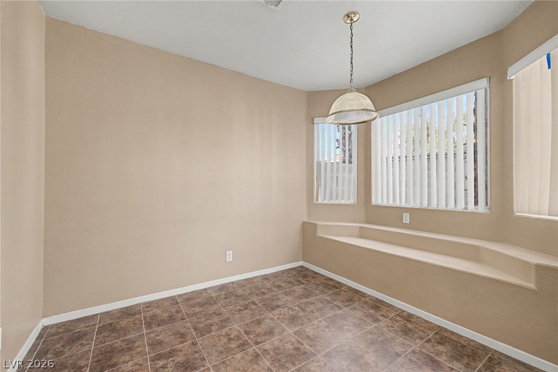 2223 Ramsgate Drive Henderson, NV 89074 - Photo 7 of 32 A quaint breakfast nook offers a built-in bench for comfortable dining.