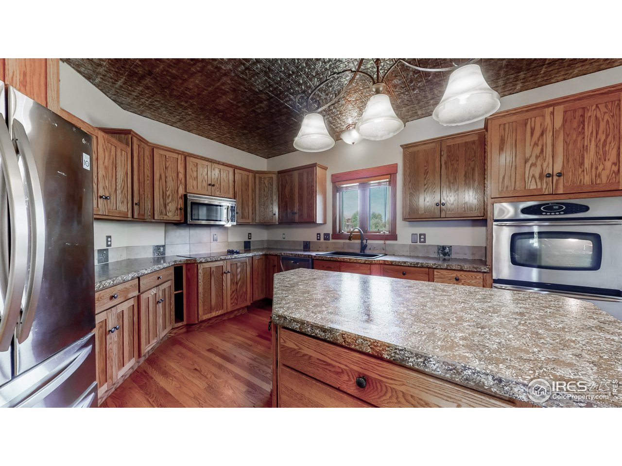 1708 Rolling Gate Road Fort Collins, CO 80526 - Photo 10 of 40 Kitchen w. Granite Tops