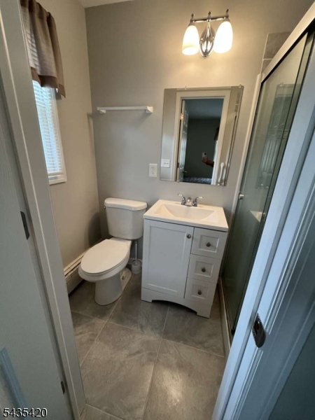 619 Foothill Road Bridgewater, NJ 08807 - Photo 20 of 23 a spacious bathroom with a toilet sink and a mirror