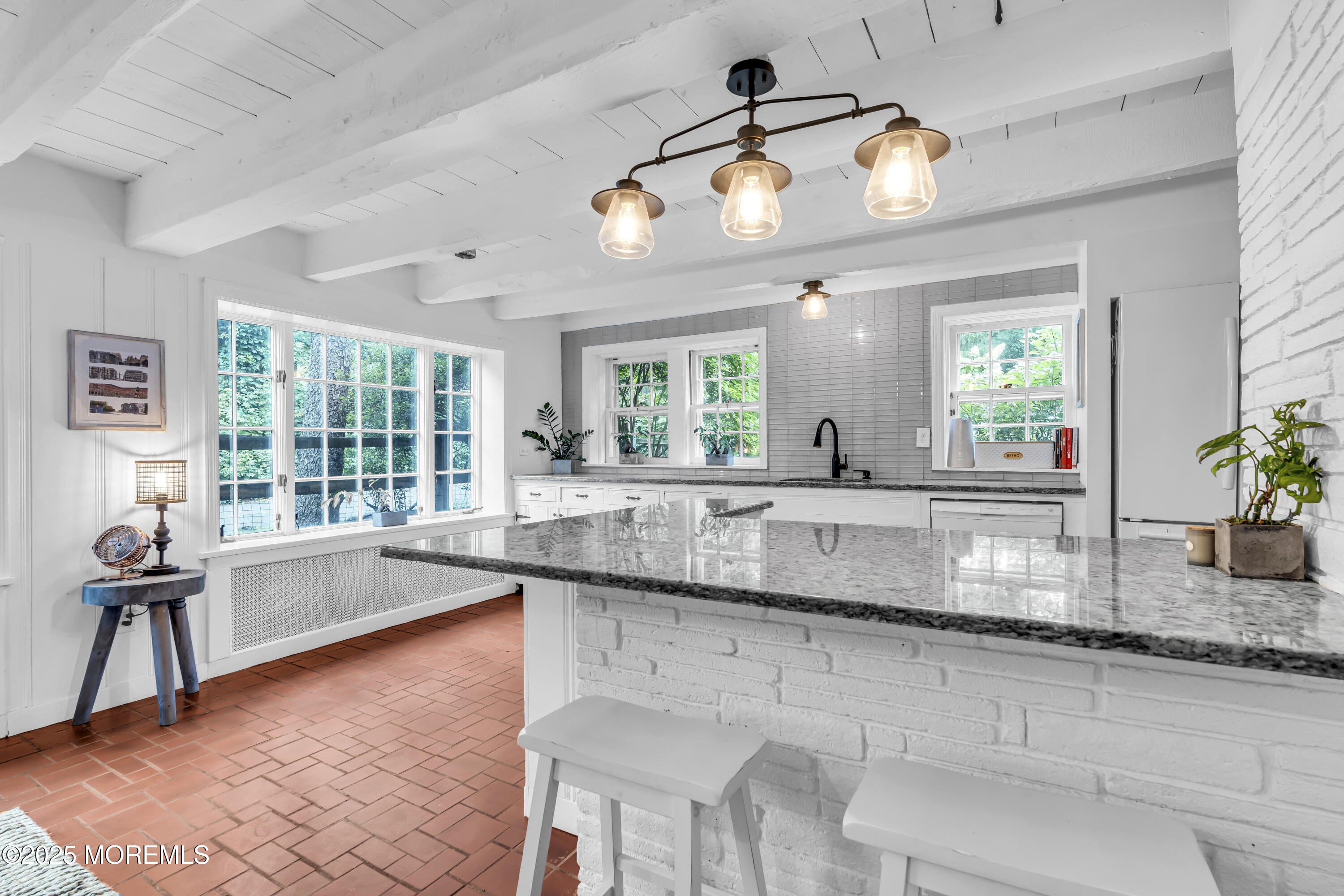 2041 Raritan Road Scotch Plains, NJ 07076 - Photo 14 of 106 a large kitchen with granite countertop a sink and a large window