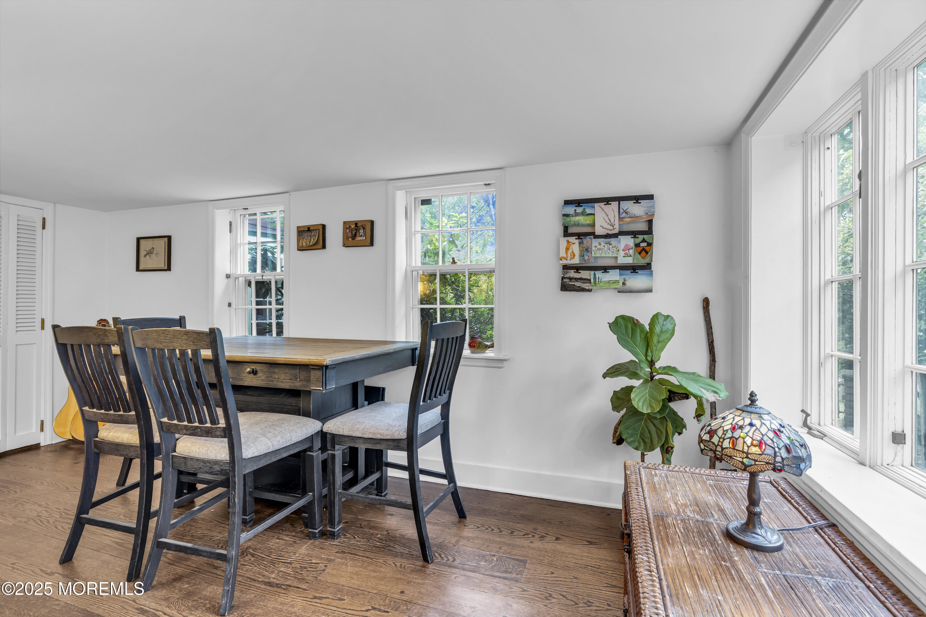 2041 Raritan Road Scotch Plains, NJ 07076 - Photo 24 of 106 a view of a dining room with furniture window and wooden floor