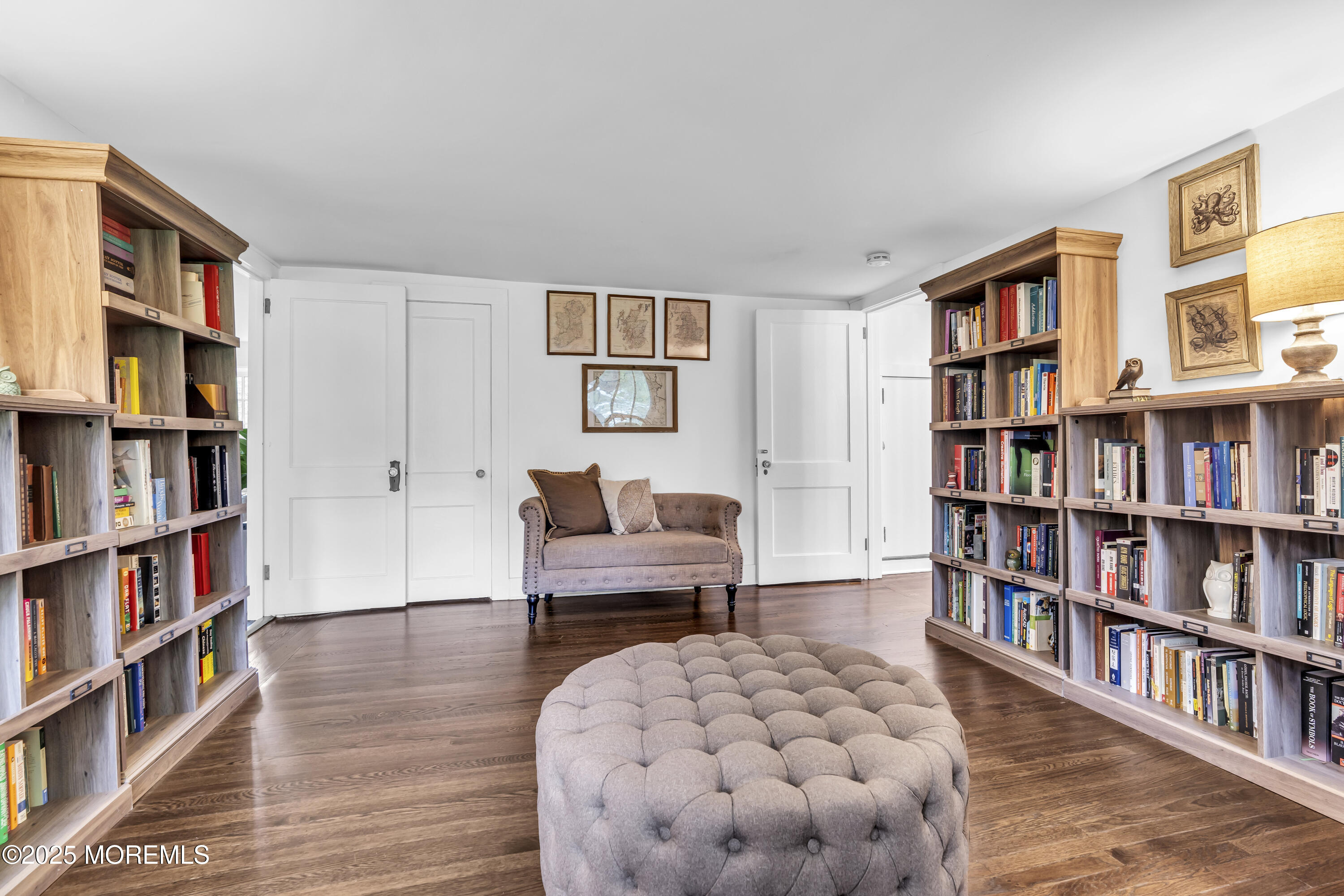 2041 Raritan Road Scotch Plains, NJ 07076 - Photo 30 of 106 a living room with a book shelf and a book shelf