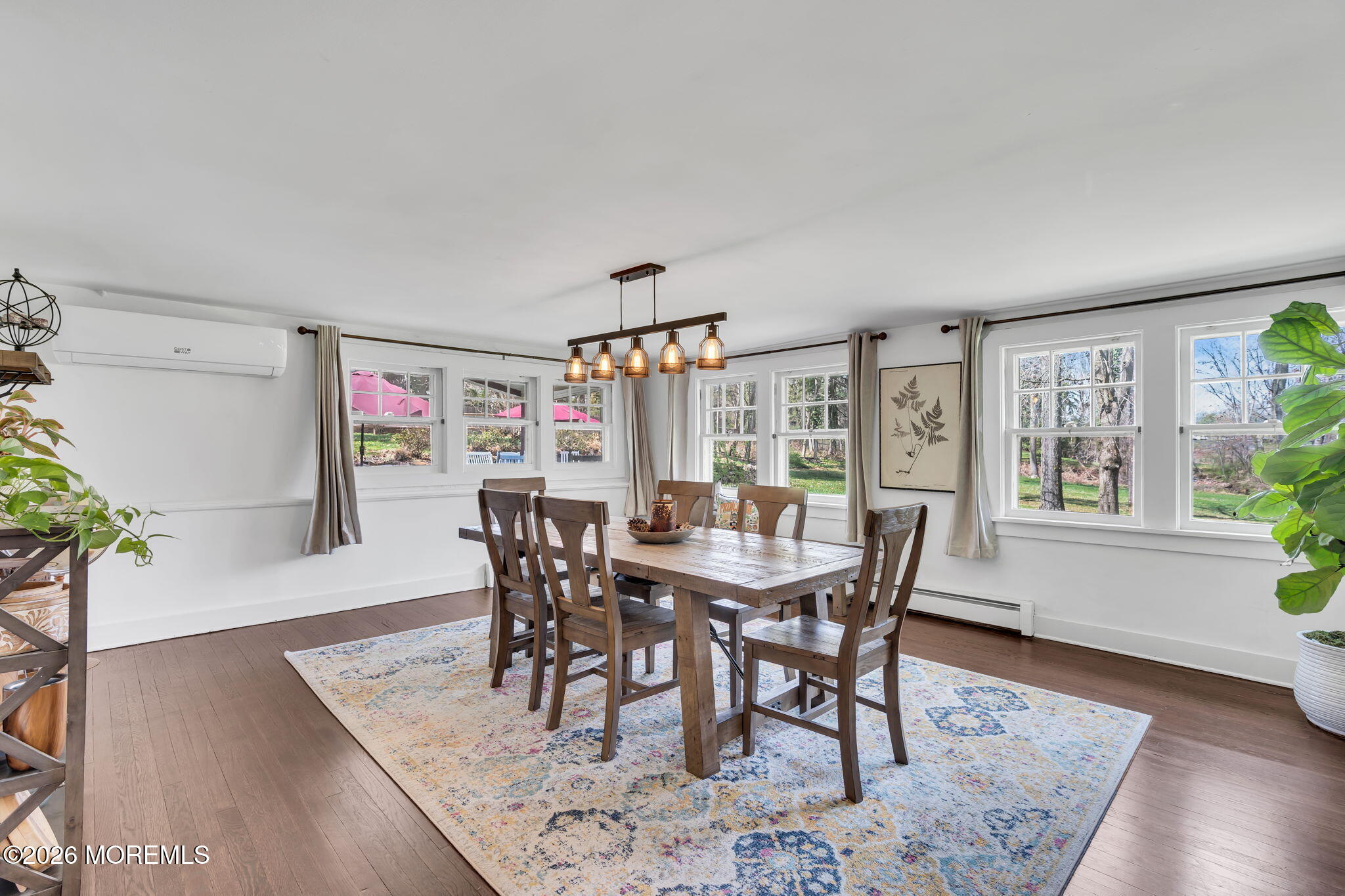 2041 Raritan Road Scotch Plains, NJ 07076 - Photo 38 of 106 a view of a dining room with furniture and wooden floor