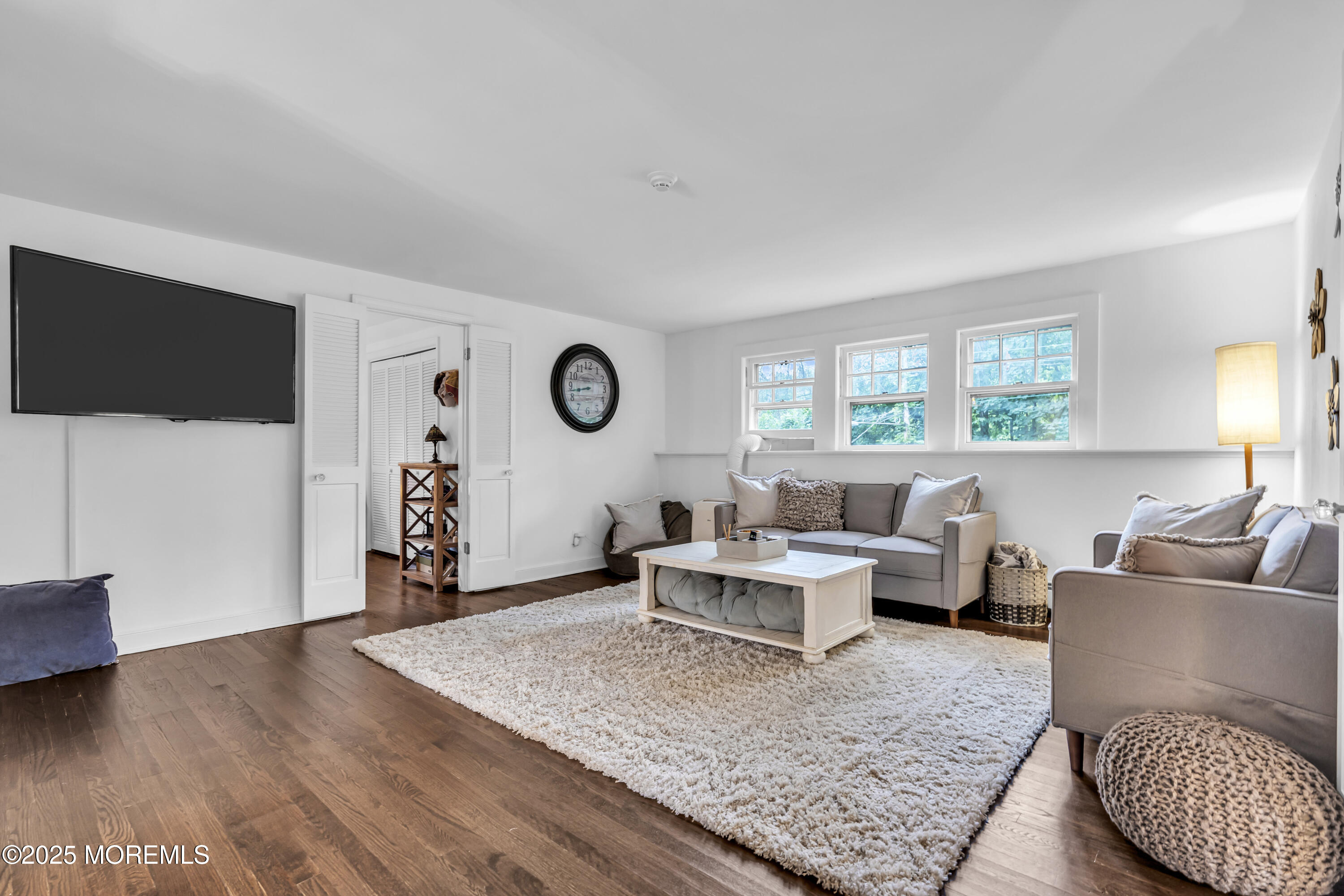 2041 Raritan Road Scotch Plains, NJ 07076 - Photo 70 of 106 a living room with furniture and a flat screen tv