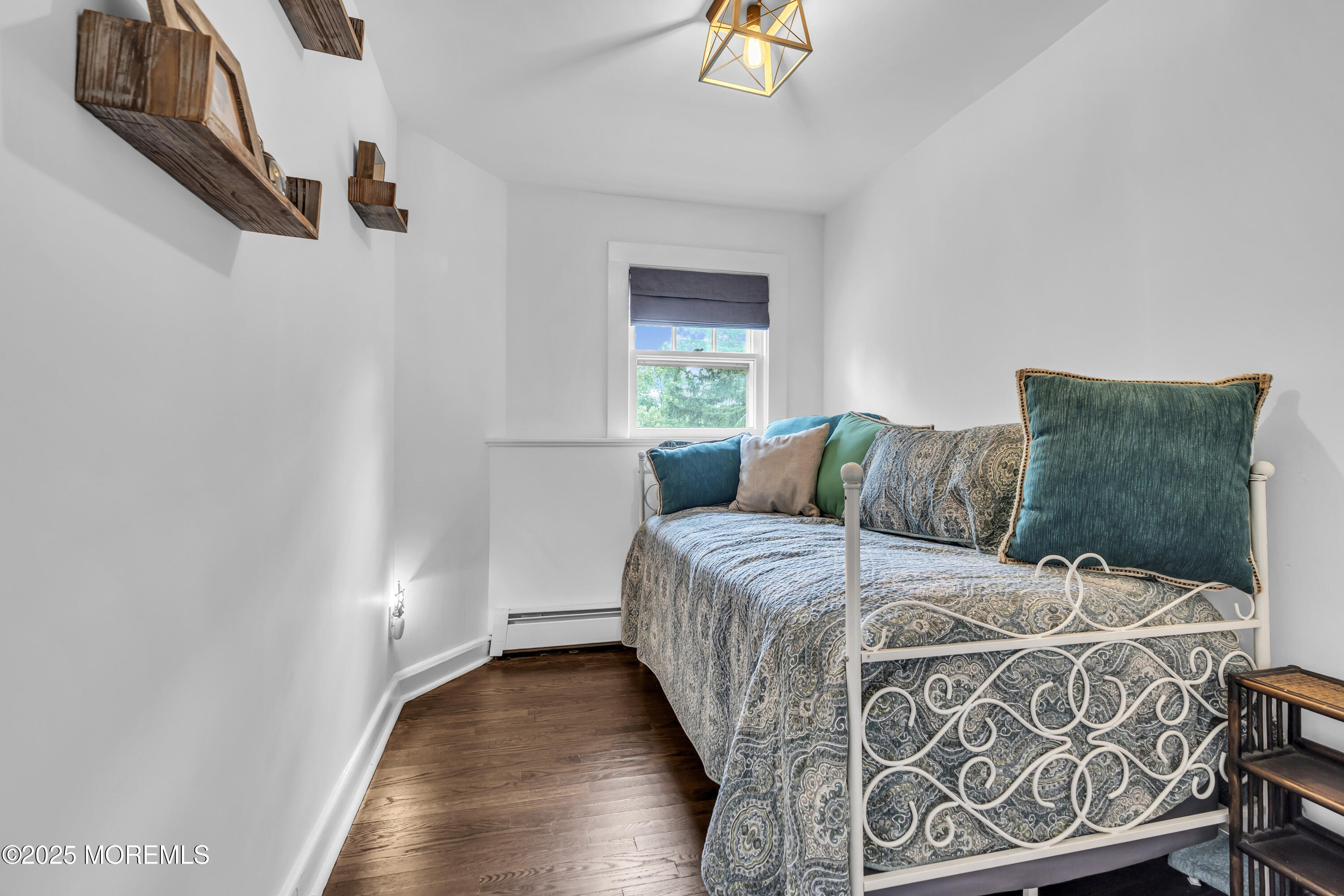 2041 Raritan Road Scotch Plains, NJ 07076 - Photo 76 of 106 a bedroom with a bed and window