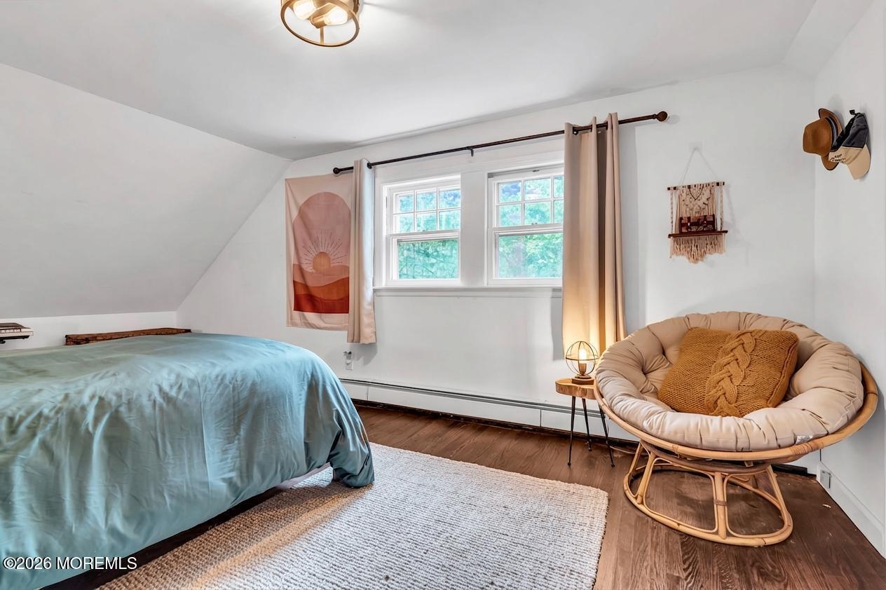 2041 Raritan Road Scotch Plains, NJ 07076 - Photo 77 of 106 a bedroom with a bed and a window