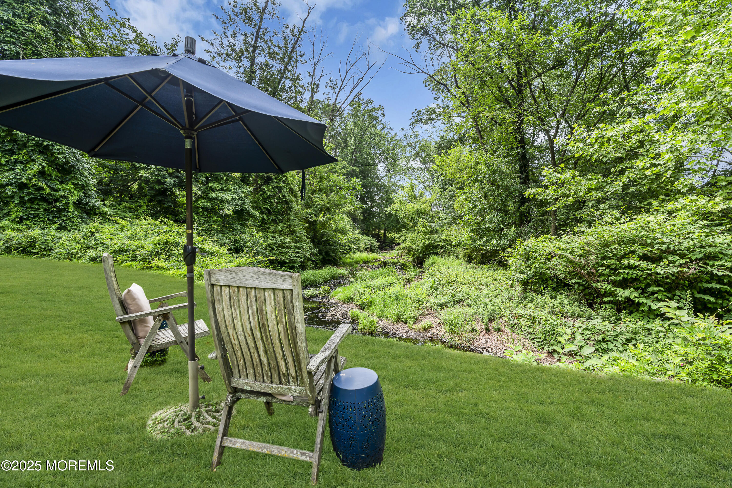 2041 Raritan Road Scotch Plains, NJ 07076 - Photo 87 of 106 a view of a chair and table in the garden