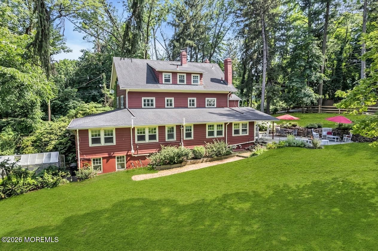 2041 Raritan Road Scotch Plains, NJ 07076 - Photo 95 of 106 a front view of a house with a garden