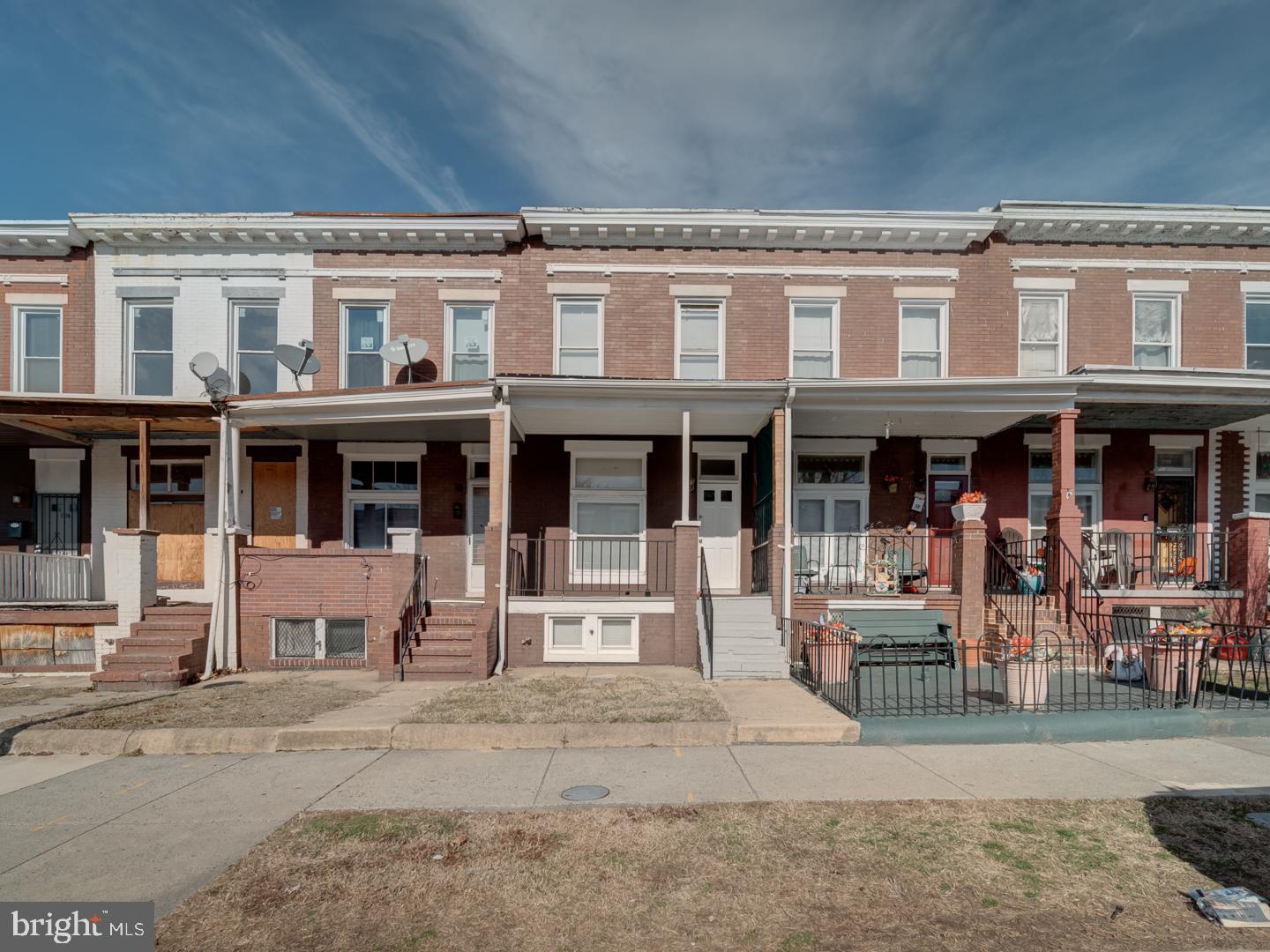 1716 Homestead Street Baltimore, MD 21218 - Photo 1 of 48 a view of a building with a lot of windows