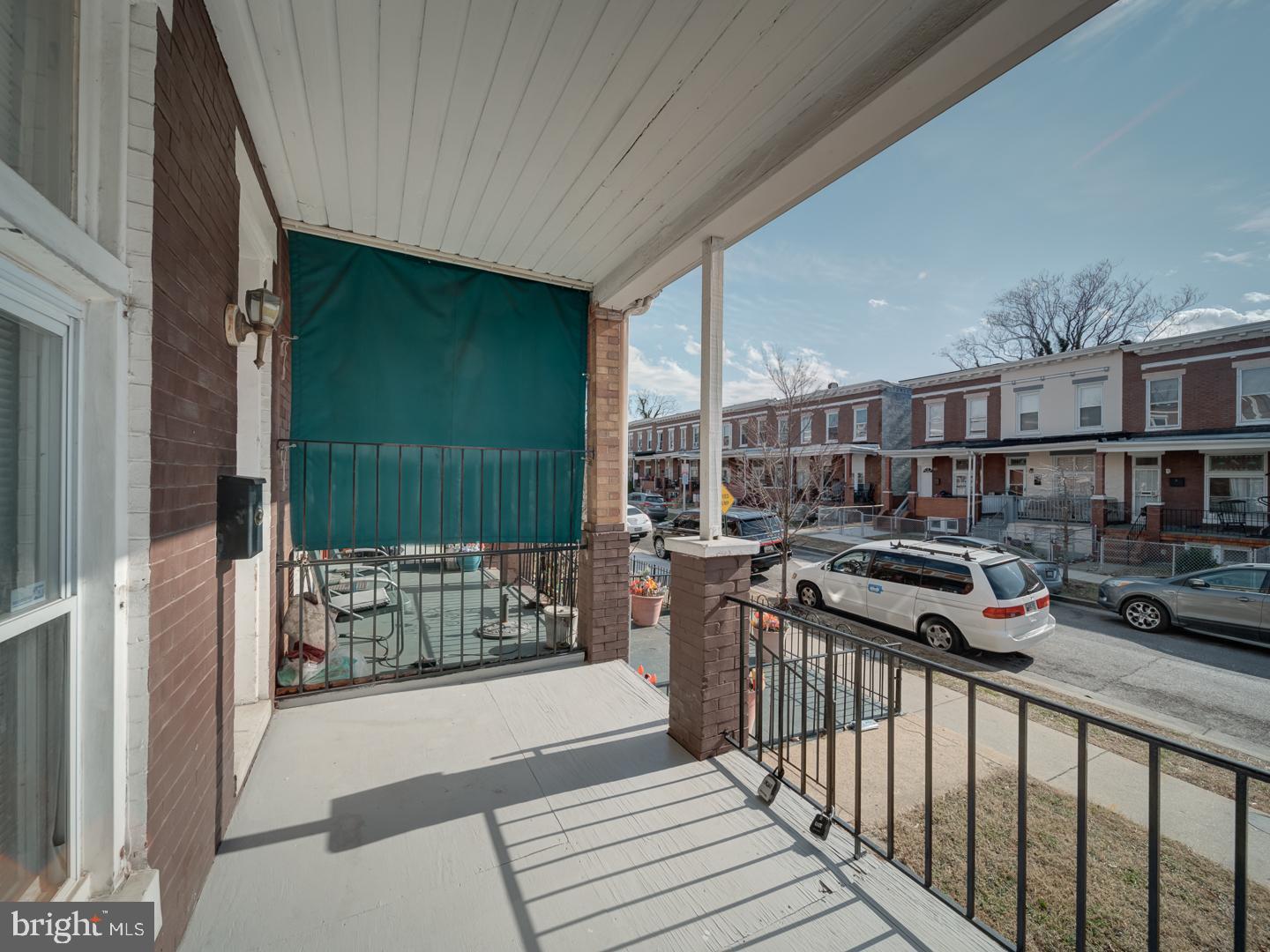 1716 Homestead Street Baltimore, MD 21218 - Photo 48 of 48 a view of a patio with table and chairs