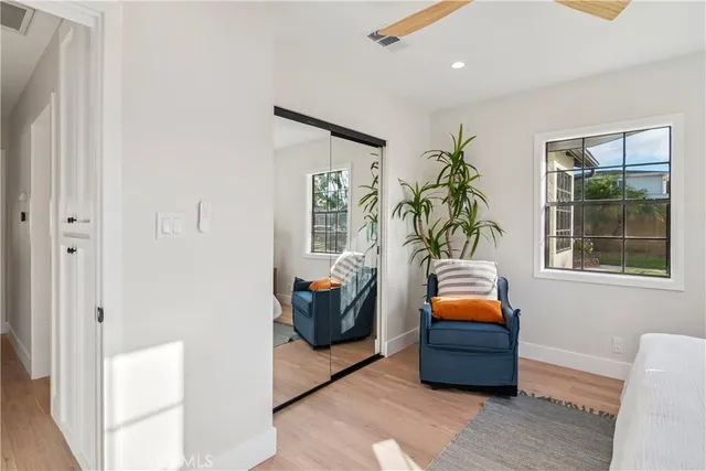 a room that has a bed and a window