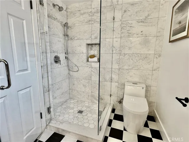 an aerial view of houses with outdoor space