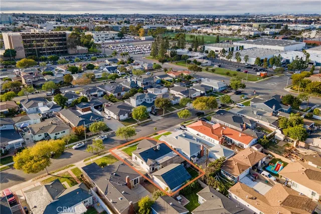 an aerial view of a house with a lake view
