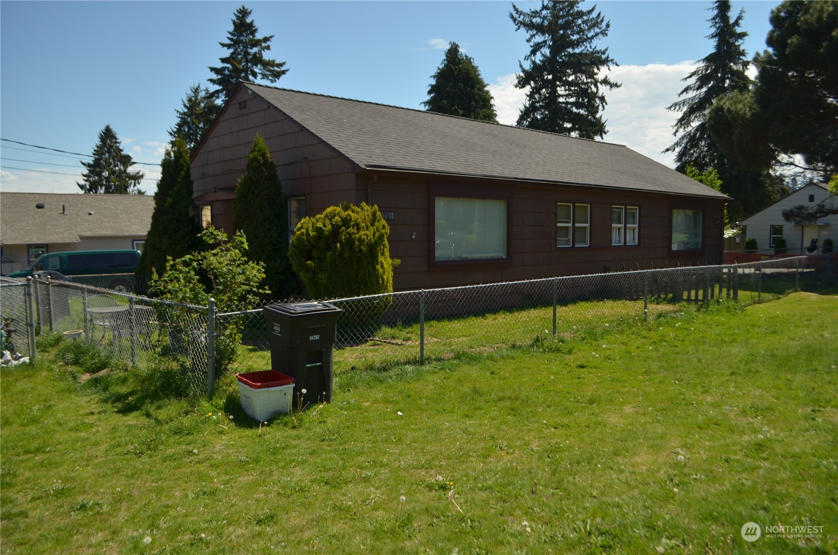 a backyard of a house with lots of green space