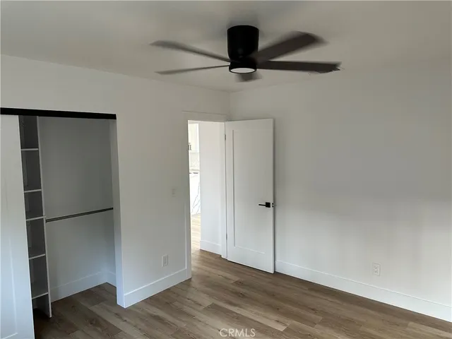 a bathroom with a shower and a toilet