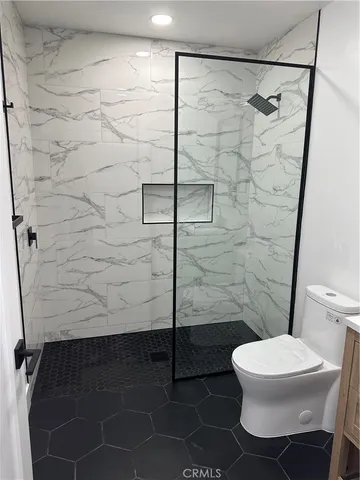 a kitchen with a stove and a sink