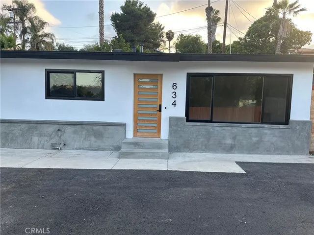 a bathroom with a sink and a large mirror