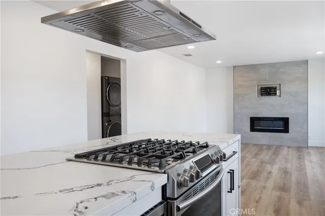 a kitchen with a sink and a window
