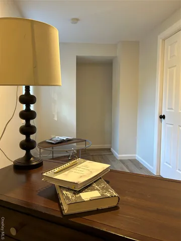 a view of a living room and bathroom