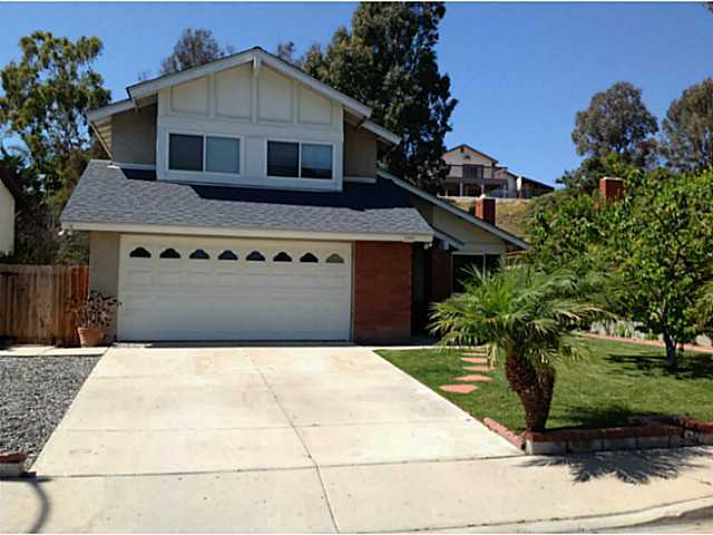Front of home with nice landscaping