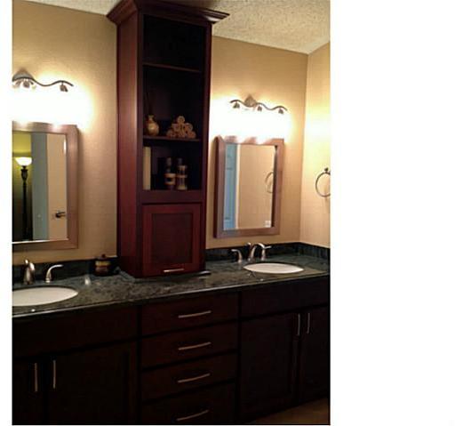 399 Compass Road Oceanside, CA 92054 - Photo 17 of 24 Remodeled master bath with dual sinks, granite counters and storage.