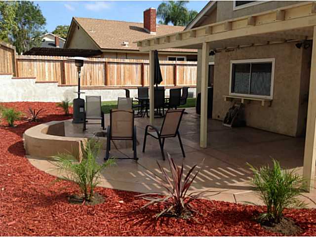 399 Compass Road Oceanside, CA 92054 - Photo 21 of 24 Perfect backyard for entertaining. Covered patio, fire pit and grassy area