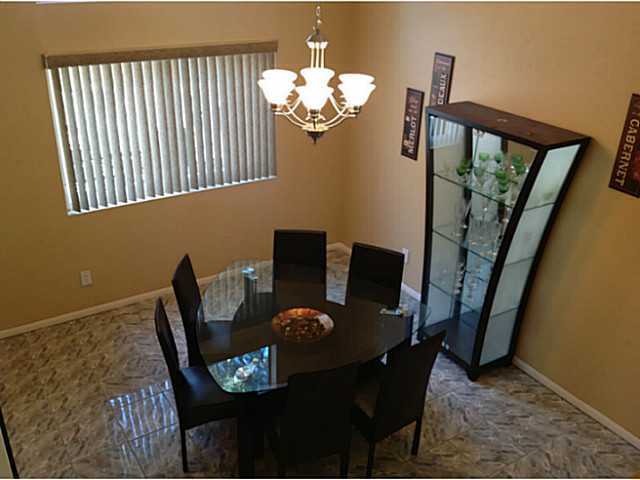 399 Compass Road Oceanside, CA 92054 - Photo 6 of 24 Dining room with vaulted ceilings, and large windows.