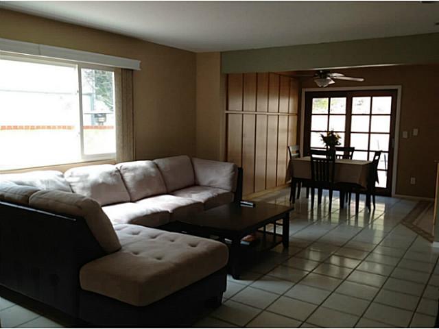 399 Compass Road Oceanside, CA 92054 - Photo 9 of 24 Family room opens to breakfast room and kitchen with french sliders to the backyard. There is even a wet bar! Excellent for entertaining