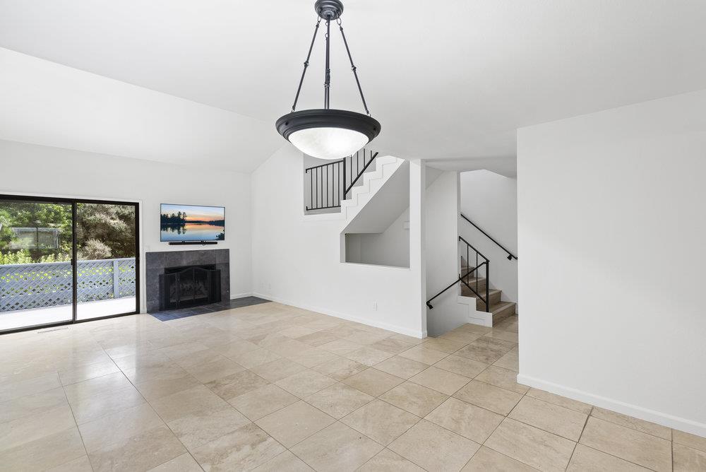 1313 Vía Tornasol Aptos, CA 95003 - Photo 16 of 38 a view of an empty room with a fireplace
