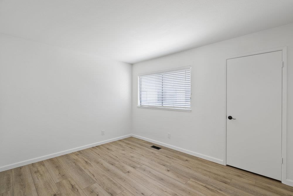 1313 Vía Tornasol Aptos, CA 95003 - Photo 19 of 38 wooden floor in an empty room