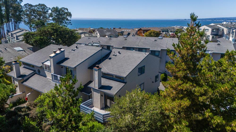 1313 Vía Tornasol Aptos, CA 95003 - Photo 2 of 38 an aerial view of a house with a yard swimming pool and outdoor seating