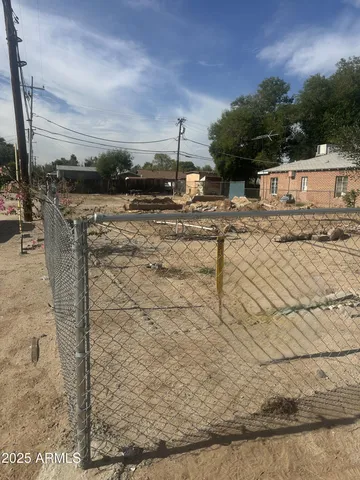 a view of a terrace with wooden fence