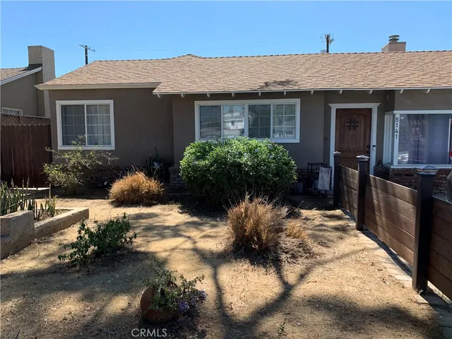 a view of a house with a patio