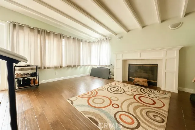 a view of living room with furniture and flat screen tv
