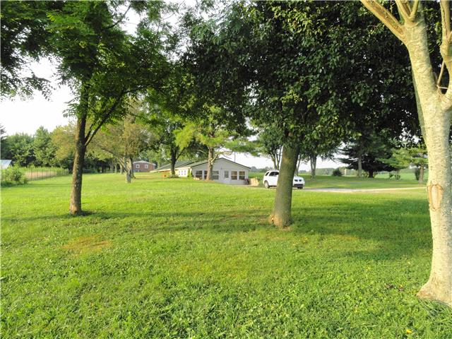 63 Overnack Road Lawrenceburg, TN 38464 - Photo 15 of 20 Home & Barn as seen from far left of property near the detached garage.